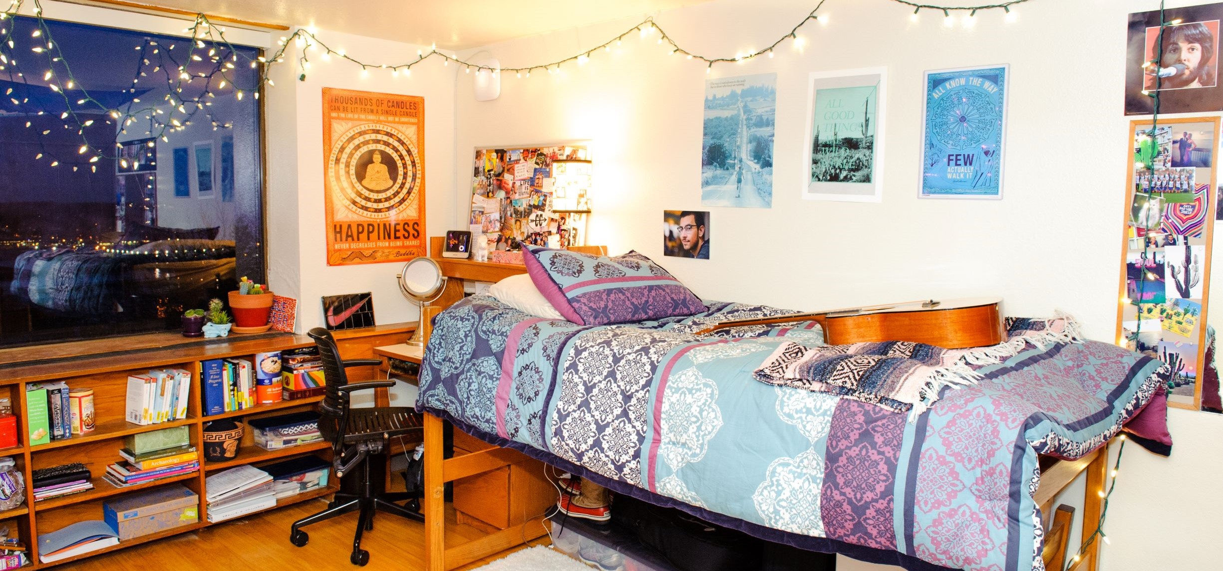 One side of a dorm room with essentials and decorations