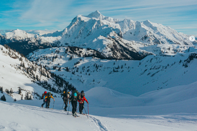Students backcountry skiing